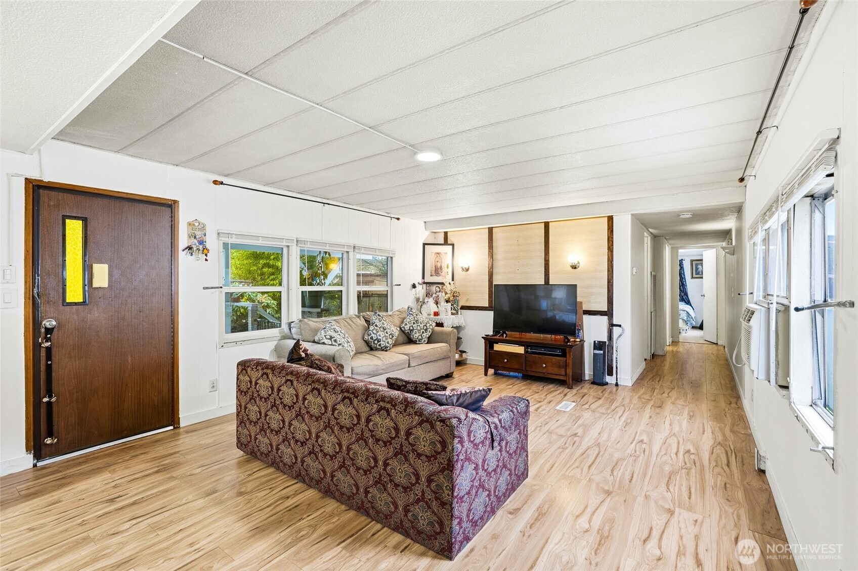 11330 East Riverside Drive, Unit 25 Bothell, WA 98011 - Photo 12 of 19 a living room with furniture and a fireplace