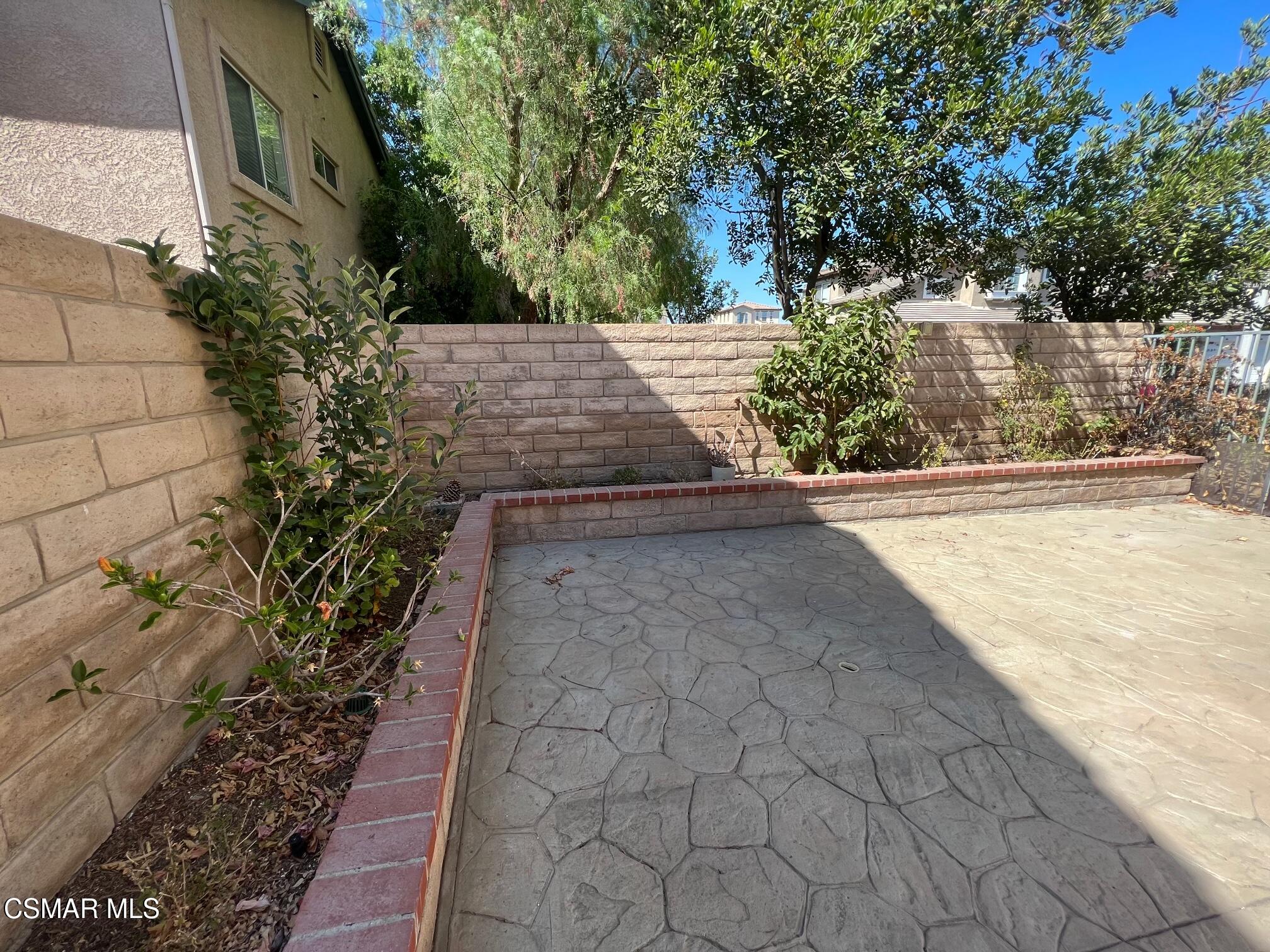 1961 Brookberry Lane Simi Valley, CA 93065 - Photo 20 of 23 a view of a pathway both side of the house
