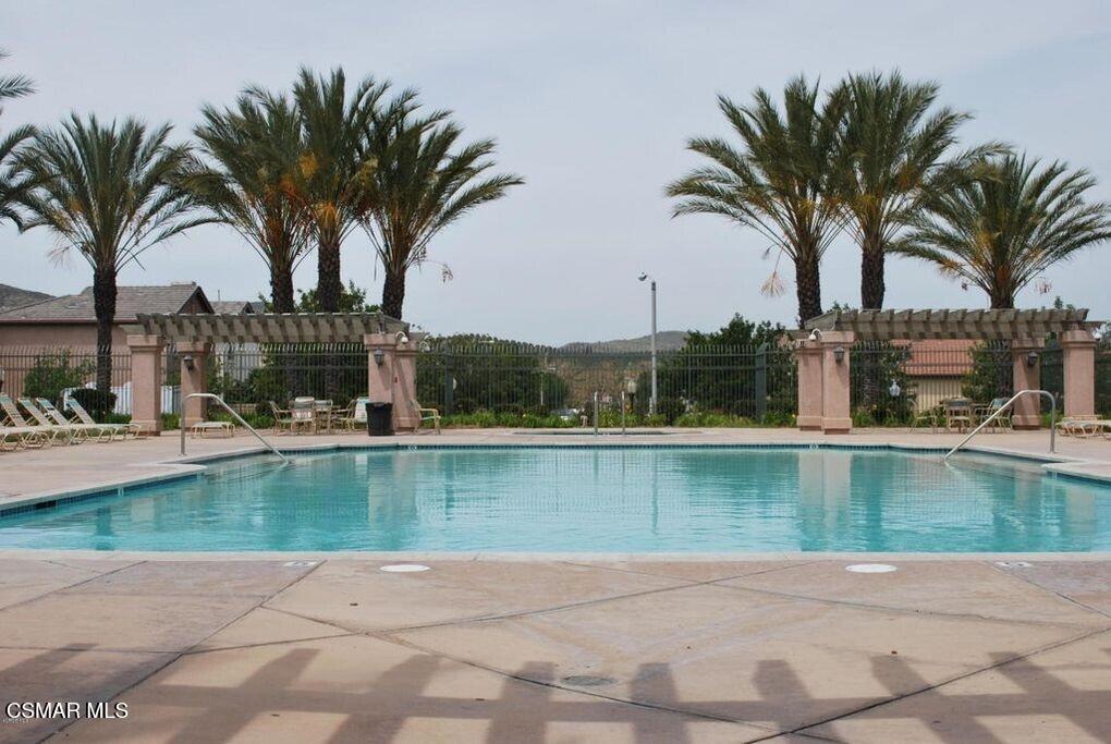 1961 Brookberry Lane Simi Valley, CA 93065 - Photo 21 of 23 a view of a swimming pool and a chair