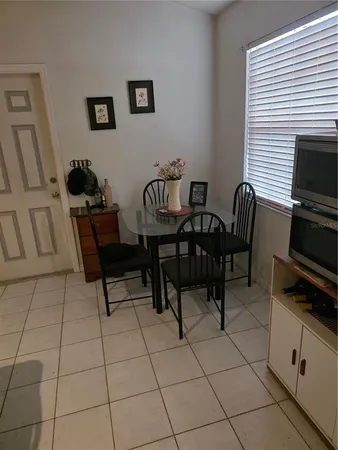 a view of a workspace with furniture