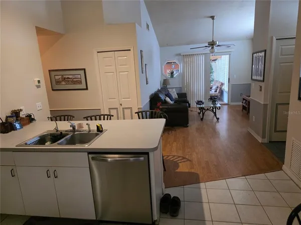 a kitchen with a sink and cabinets