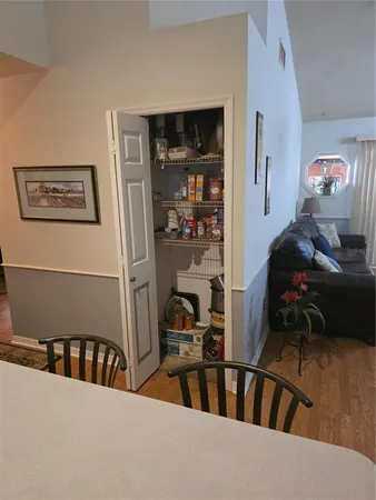 a view of a living room and dining room