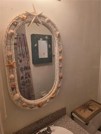 a bathroom with a toilet and a sink