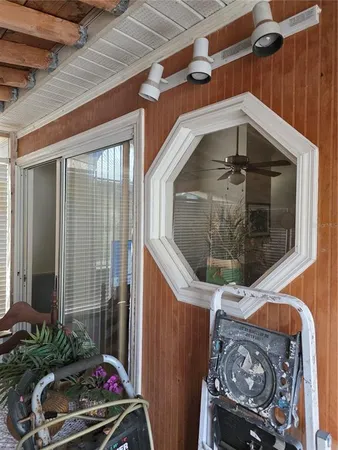 a view of a roof deck with furniture