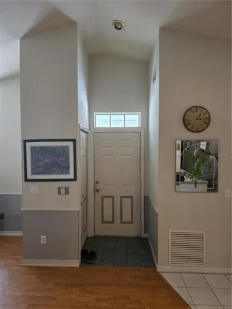 a view of a hallway with entryway