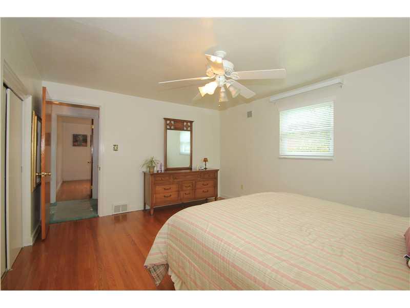 328 Rockhill Road Pittsburgh, PA 15243 - Photo 11 of 25 Master Bedroom. This alternate view of the master shows the entry to the room and the abundant closet space with double sliding doors.