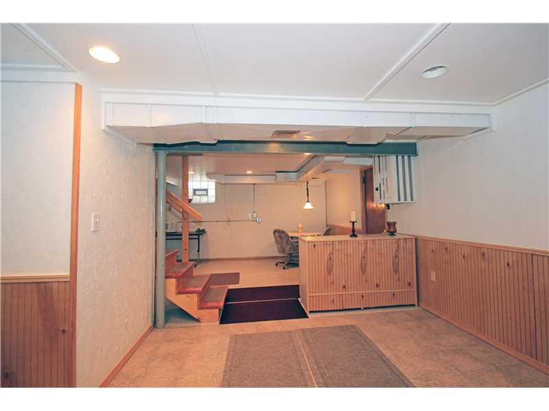 328 Rockhill Road Pittsburgh, PA 15243 - Photo 15 of 25 Family Room. This alternate view of the family room shows the divider between the family room area and what was used as a game room area.