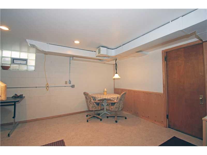 328 Rockhill Road Pittsburgh, PA 15243 - Photo 16 of 25 Other. The game room area has a hanging light over the table and some recessed lighting.