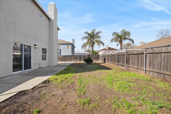 a view of a backyard with a garden