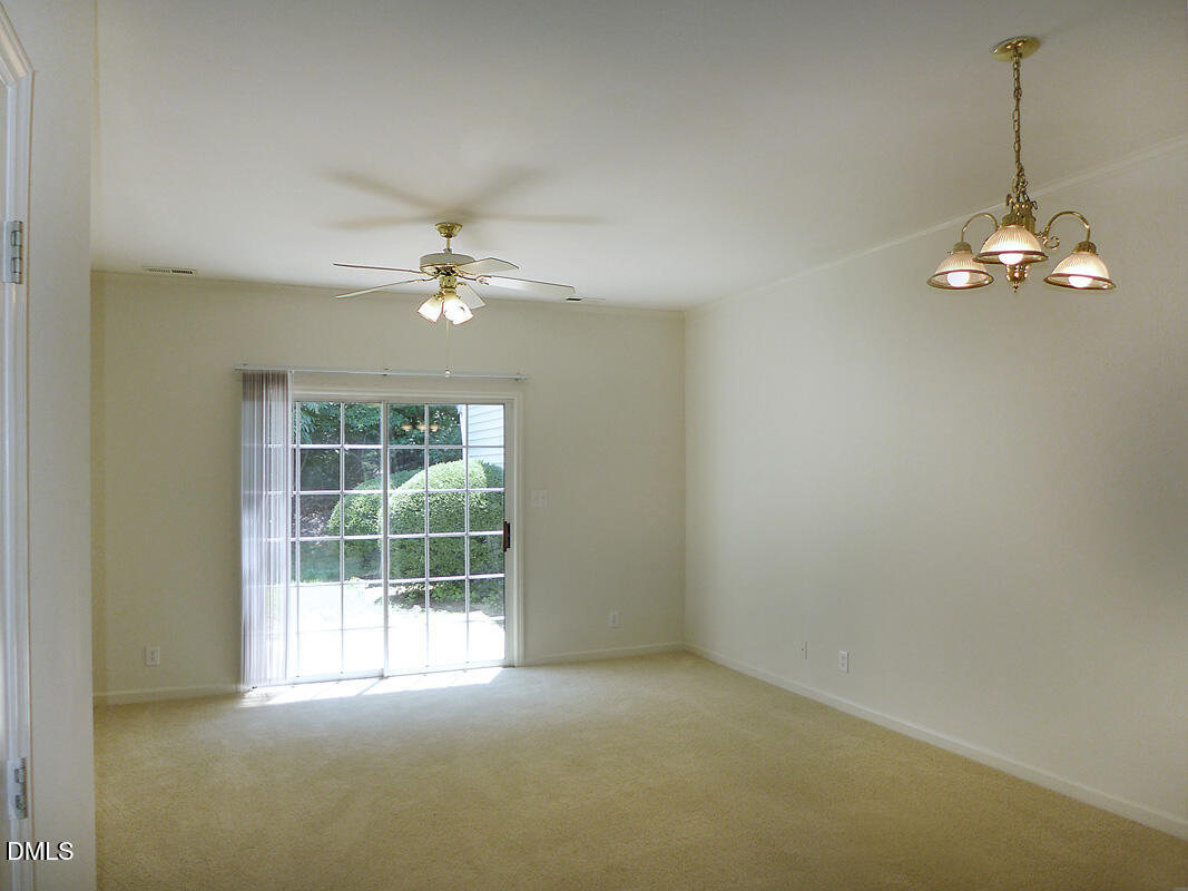 101 Rock Haven Road, Unit C301 Carrboro, NC 27510 - Photo 2 of 12 a view of a livingroom with a chandelier fan