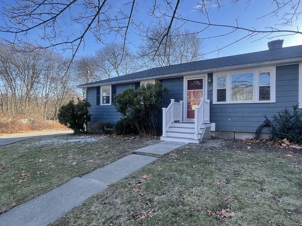 58 Neillian Way, Unit 58 Bedford, MA 01730 - Photo 23 of 23 a front view of a house with garden