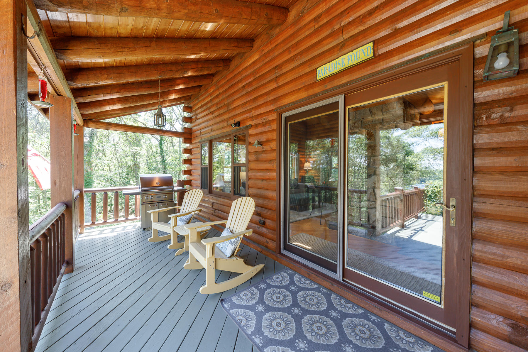 252 Valley Road Plymouth, MA 02360 - Photo 27 of 78 a view of a patio with table and chairs and wooden floor