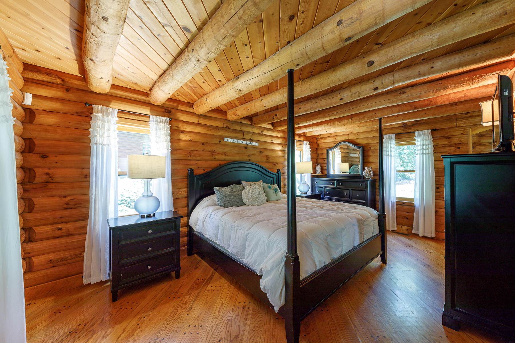 252 Valley Road Plymouth, MA 02360 - Photo 32 of 78 a bedroom with a bed and a large window