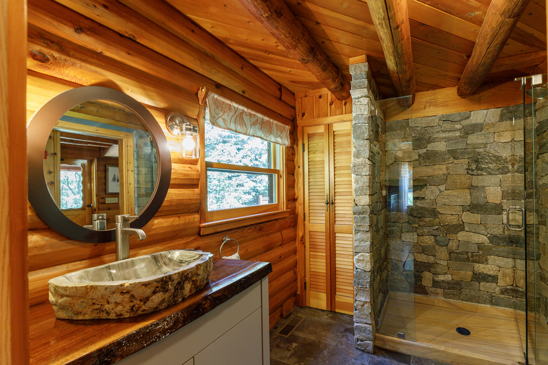 252 Valley Road Plymouth, MA 02360 - Photo 37 of 78 a bathroom with a mirror and a shower