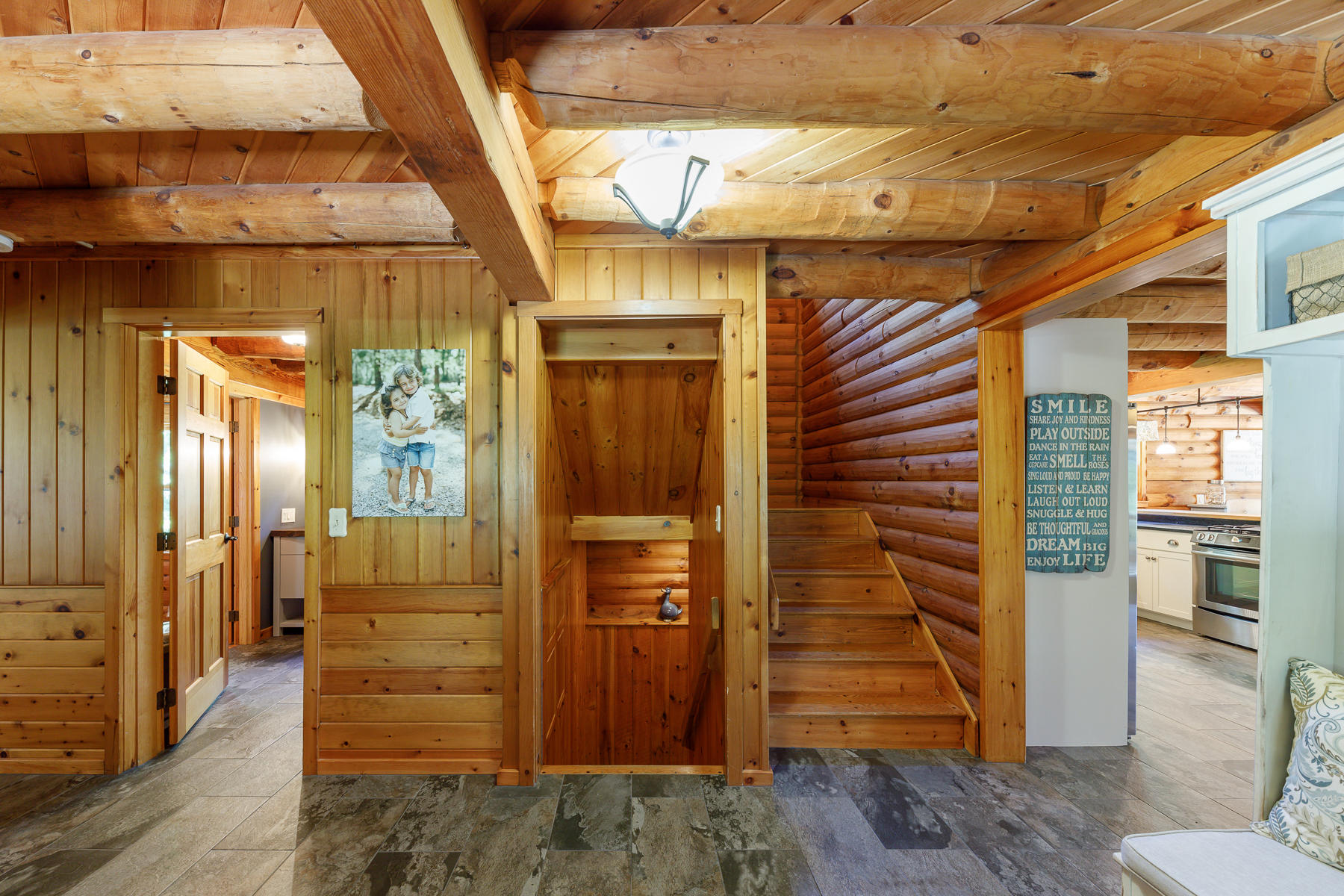 252 Valley Road Plymouth, MA 02360 - Photo 38 of 78 a view of a hallway with wooden floor and staircase