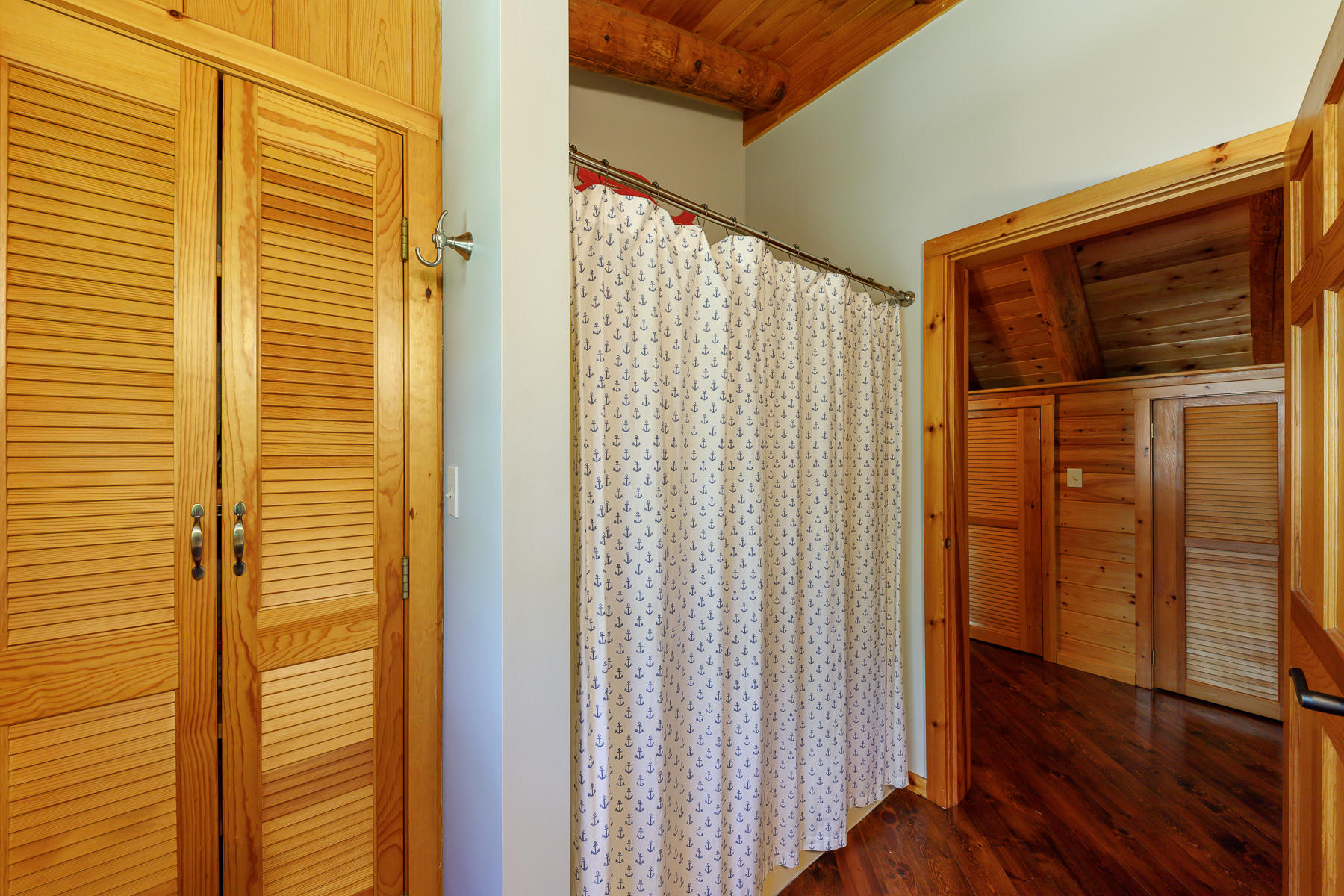 252 Valley Road Plymouth, MA 02360 - Photo 43 of 78 a view of a bathroom with a shower curtain