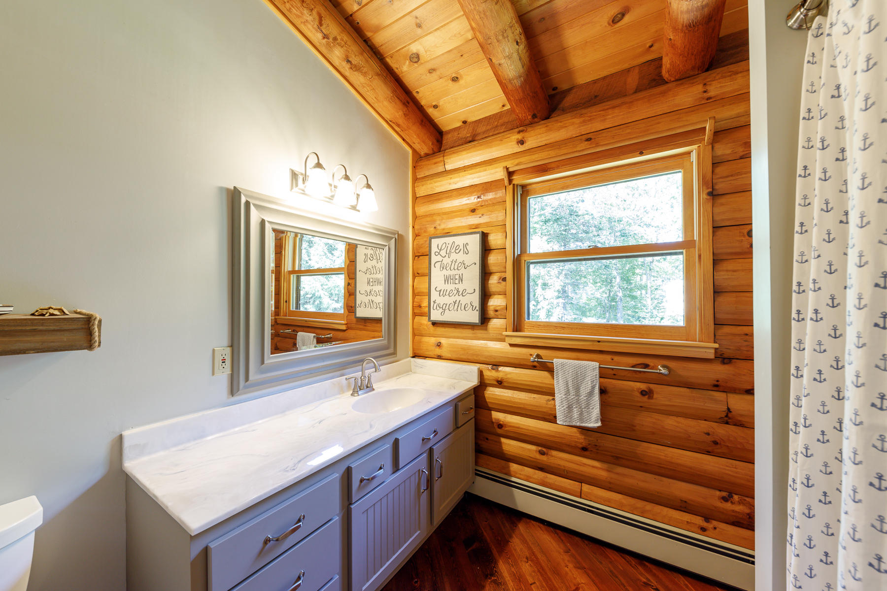 252 Valley Road Plymouth, MA 02360 - Photo 44 of 78 a bathroom with a sink and a large window