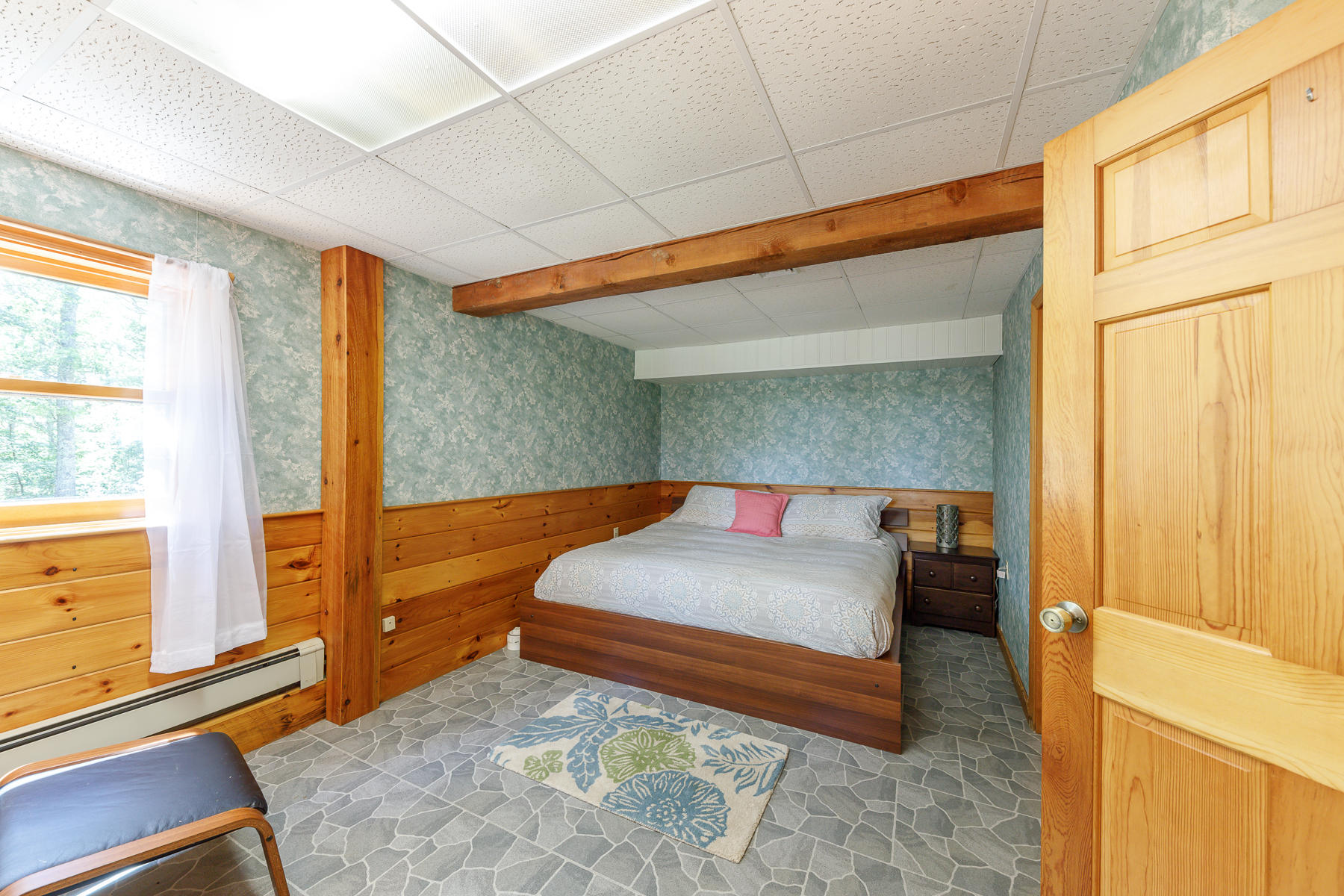 252 Valley Road Plymouth, MA 02360 - Photo 54 of 78 a bedroom with a bed and a dresser next to a window