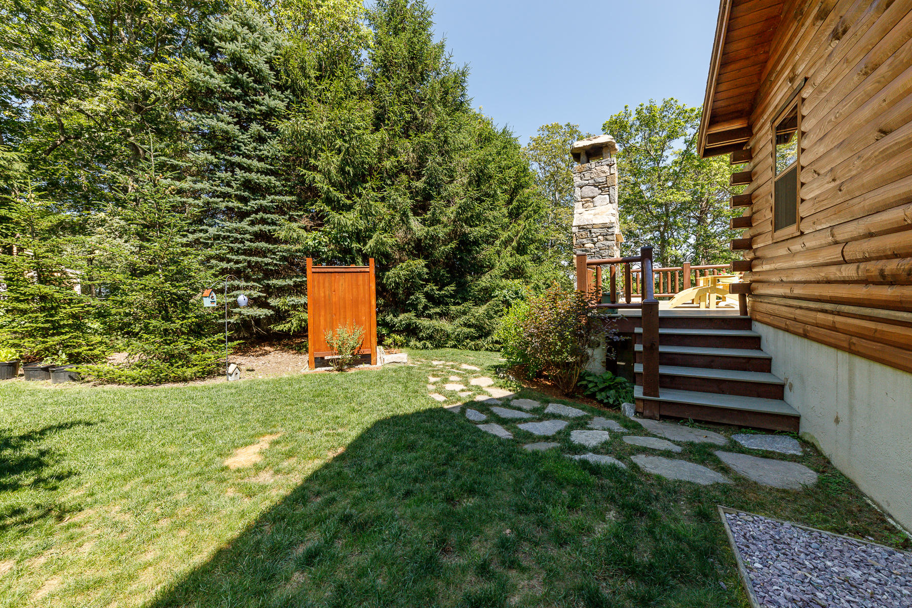 252 Valley Road Plymouth, MA 02360 - Photo 60 of 78 a backyard of a house with lots of green space