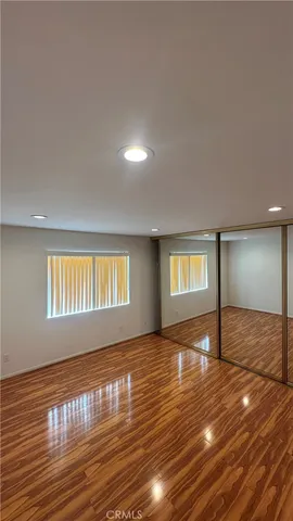 a bathroom with a sink a mirror and a shower