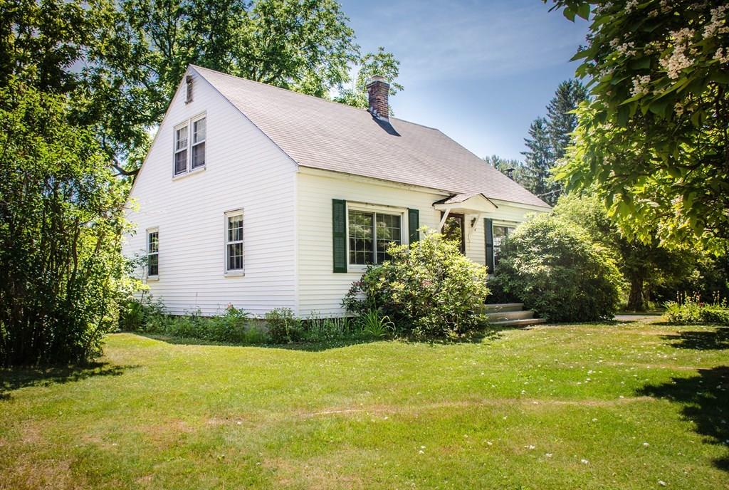 183 Lancaster Road Berlin, MA 01503 - Photo 1 of 41 a view of a house with backyard and garden