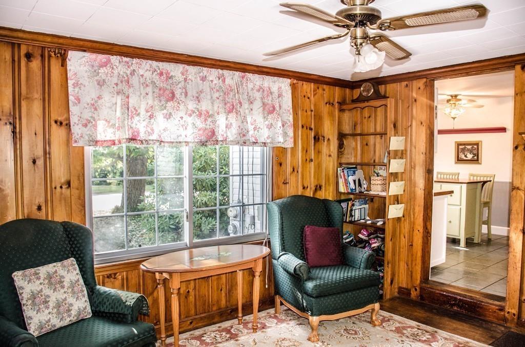 183 Lancaster Road Berlin, MA 01503 - Photo 13 of 41 a living room with furniture and a large window
