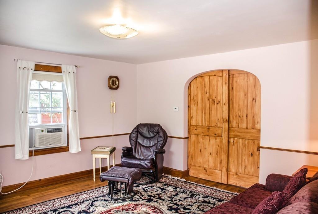 183 Lancaster Road Berlin, MA 01503 - Photo 17 of 41 a living room with furniture and a window