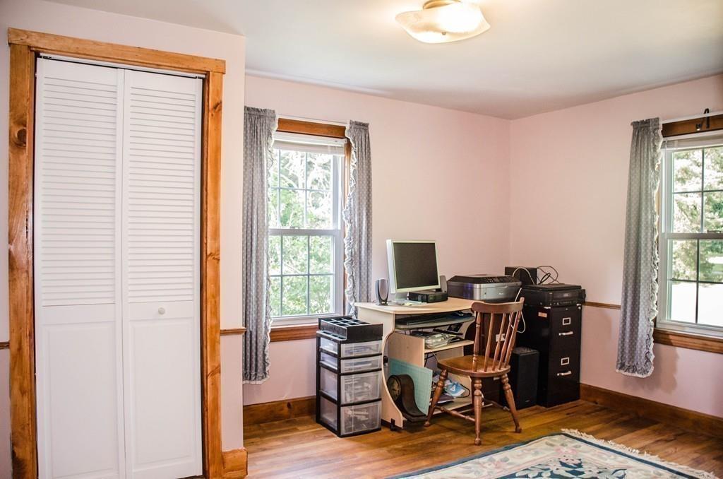 183 Lancaster Road Berlin, MA 01503 - Photo 19 of 41 a workspace with wooden floor and a window