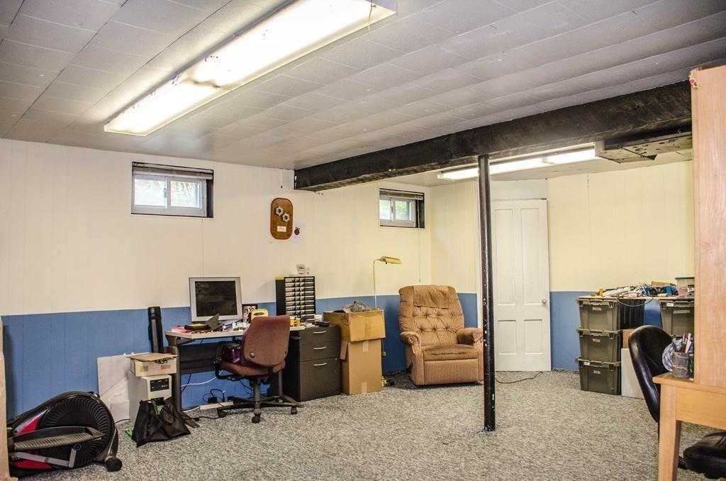 183 Lancaster Road Berlin, MA 01503 - Photo 28 of 41 a view of a workspace with furniture and a window