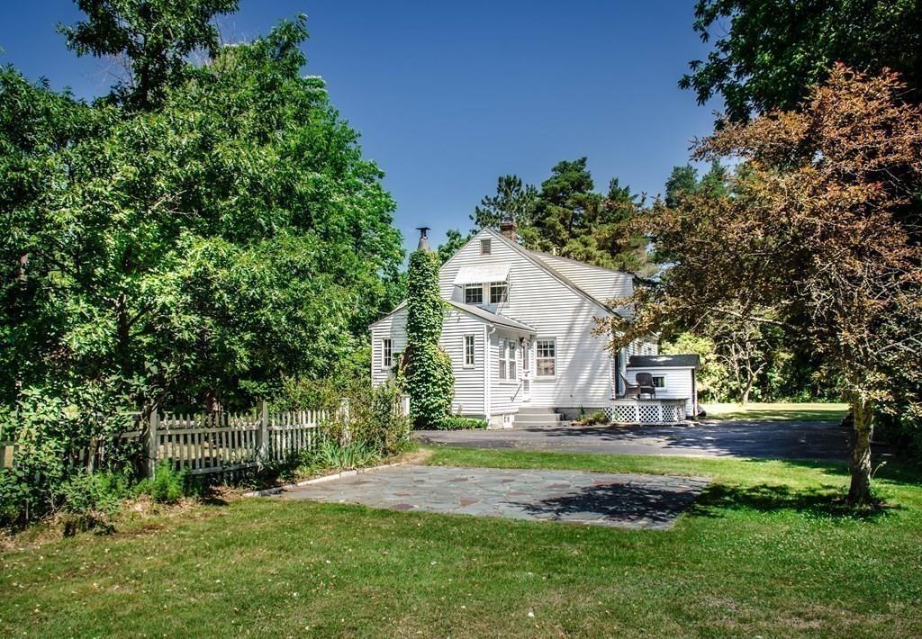 183 Lancaster Road Berlin, MA 01503 - Photo 34 of 41 a view of house with outdoor space and garden