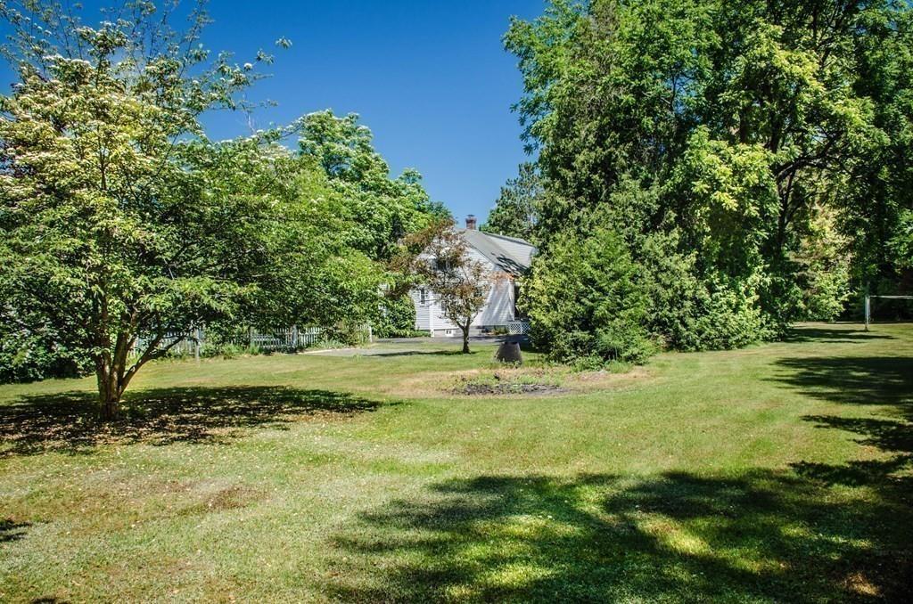 183 Lancaster Road Berlin, MA 01503 - Photo 35 of 41 a view of a yard with an trees