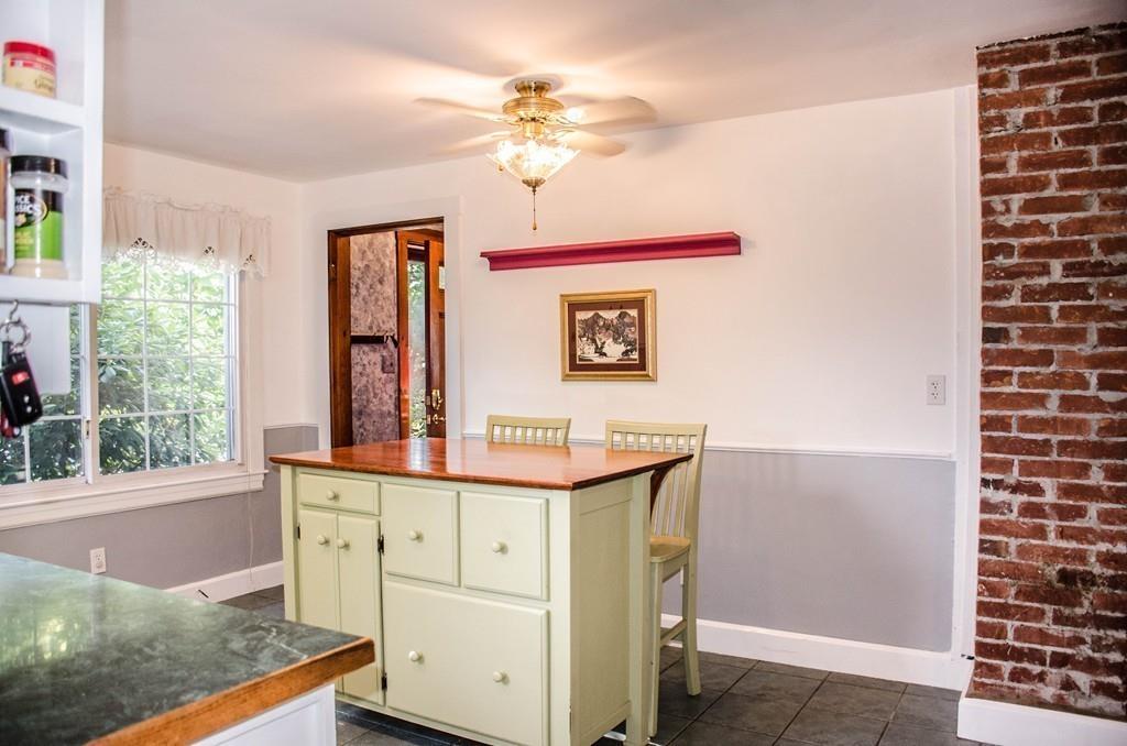 183 Lancaster Road Berlin, MA 01503 - Photo 8 of 41 a bathroom with a sink a mirror and a shower