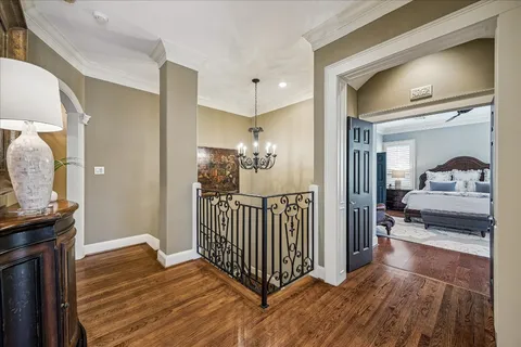 a view of a bedroom from a hallway