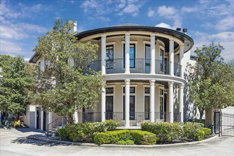 front view of a house with a small yard