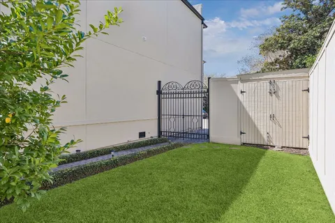 a view of a back yard of the house