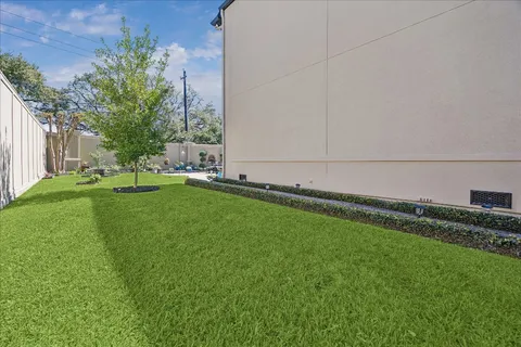 a view of a backyard with a garden