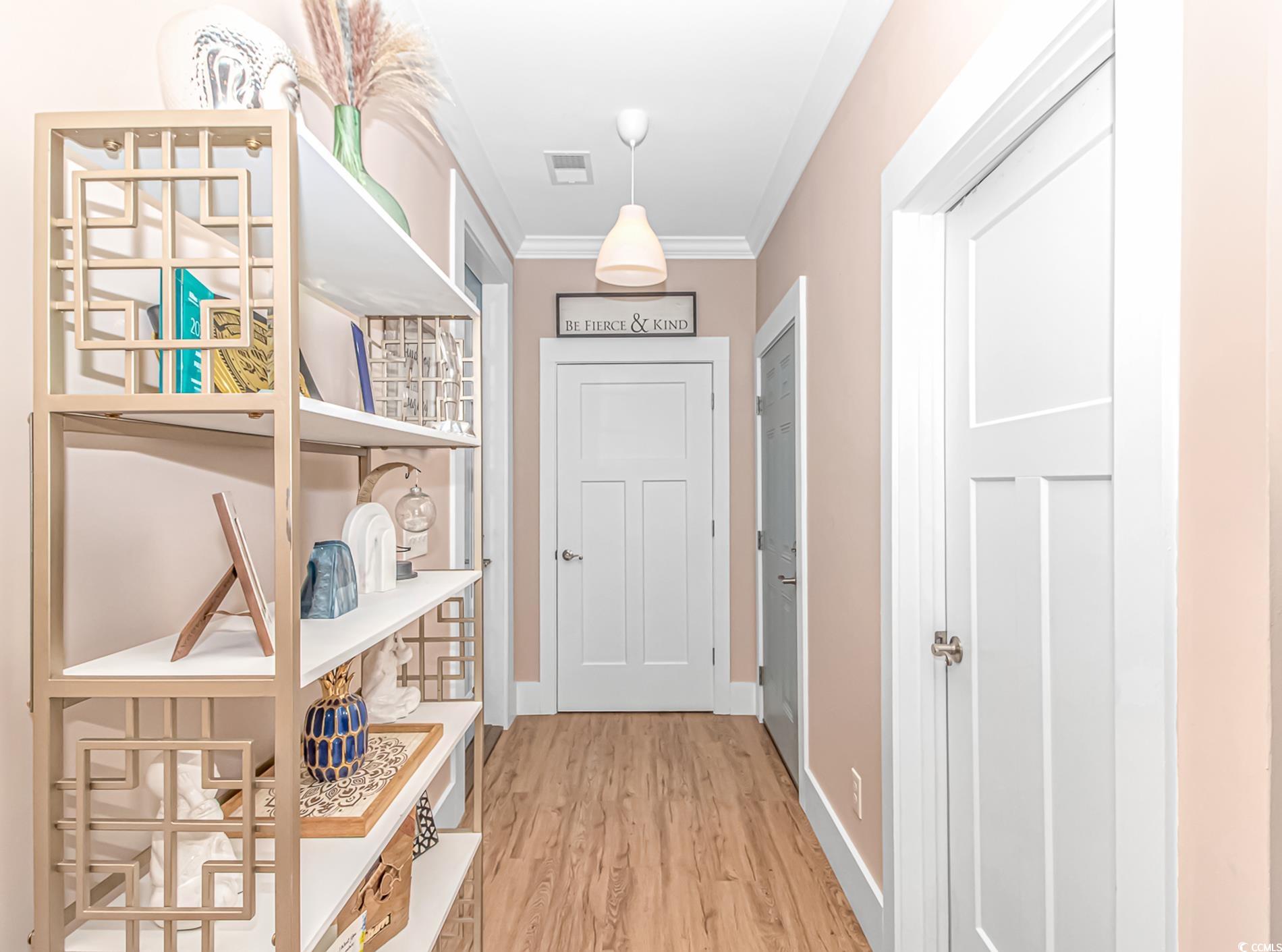 460 Boundary Avenue Murrells Inlet, SC 29576 - Photo 5 of 40 Entryway featuring crown molding and hardwood / wo