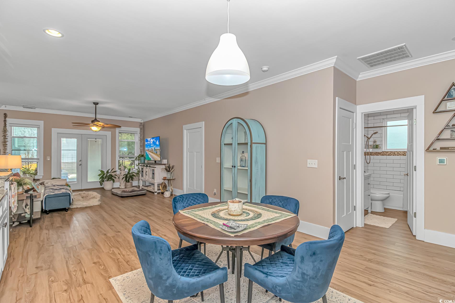 460 Boundary Avenue Murrells Inlet, SC 29576 - Photo 9 of 40 Dining room featuring french doors, light hardwood