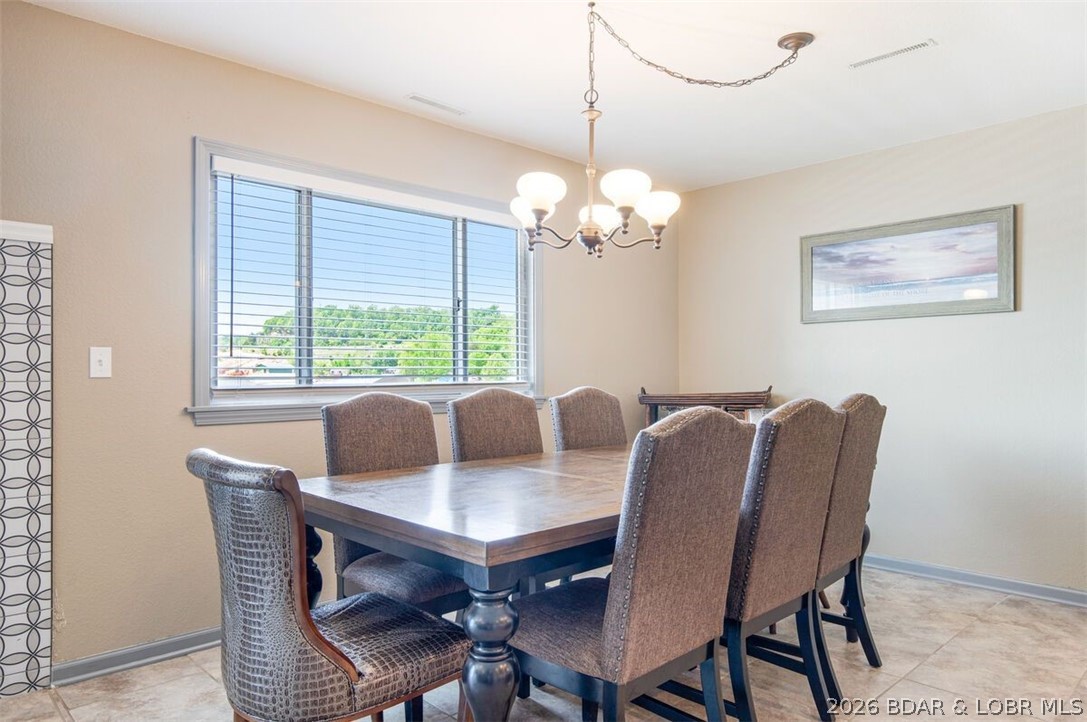 472 Jupiter Road Camdenton, MO 65020 - Photo 43 of 59 Dining for 8 and could be more.. window here works