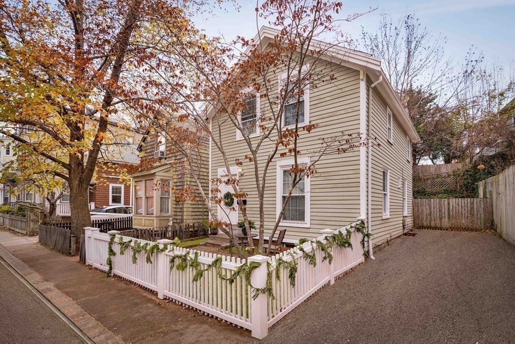 a view of a house with a street
