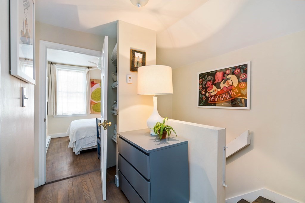 27 White Place Brookline, MA 02445 - Photo 11 of 17 a living room with furniture and a wooden floor