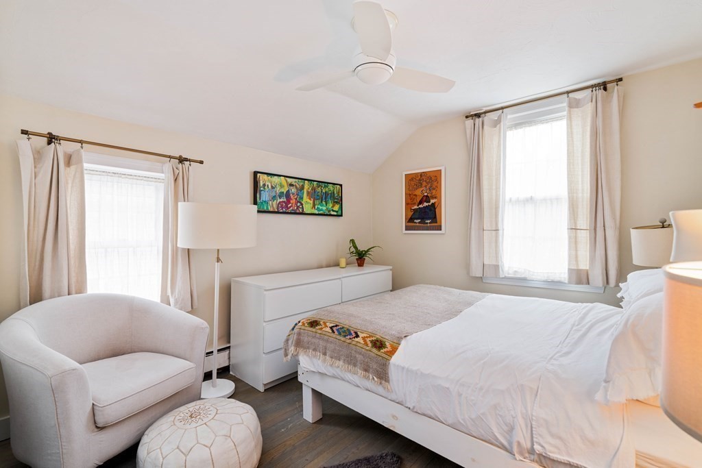 27 White Place Brookline, MA 02445 - Photo 13 of 17 a bedroom with a bed and a couch