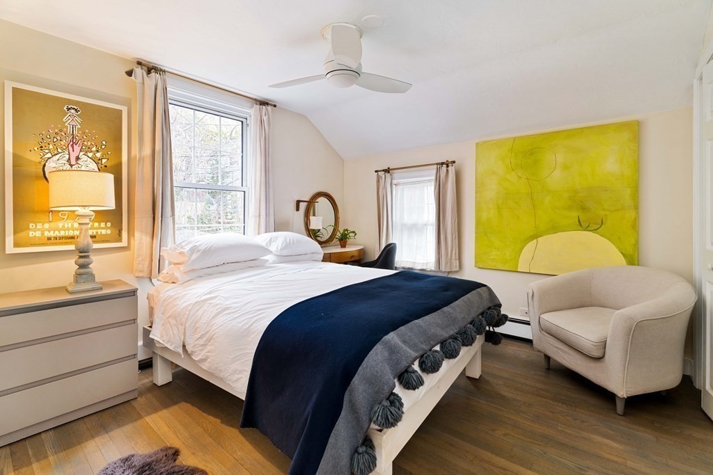 27 White Place Brookline, MA 02445 - Photo 15 of 17 a bedroom with a bed and a couch