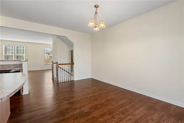 a view of a livingroom with wooden floor