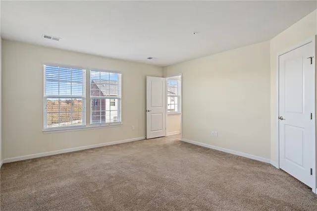 an empty room with windows