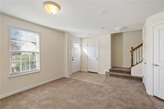 an empty room with windows