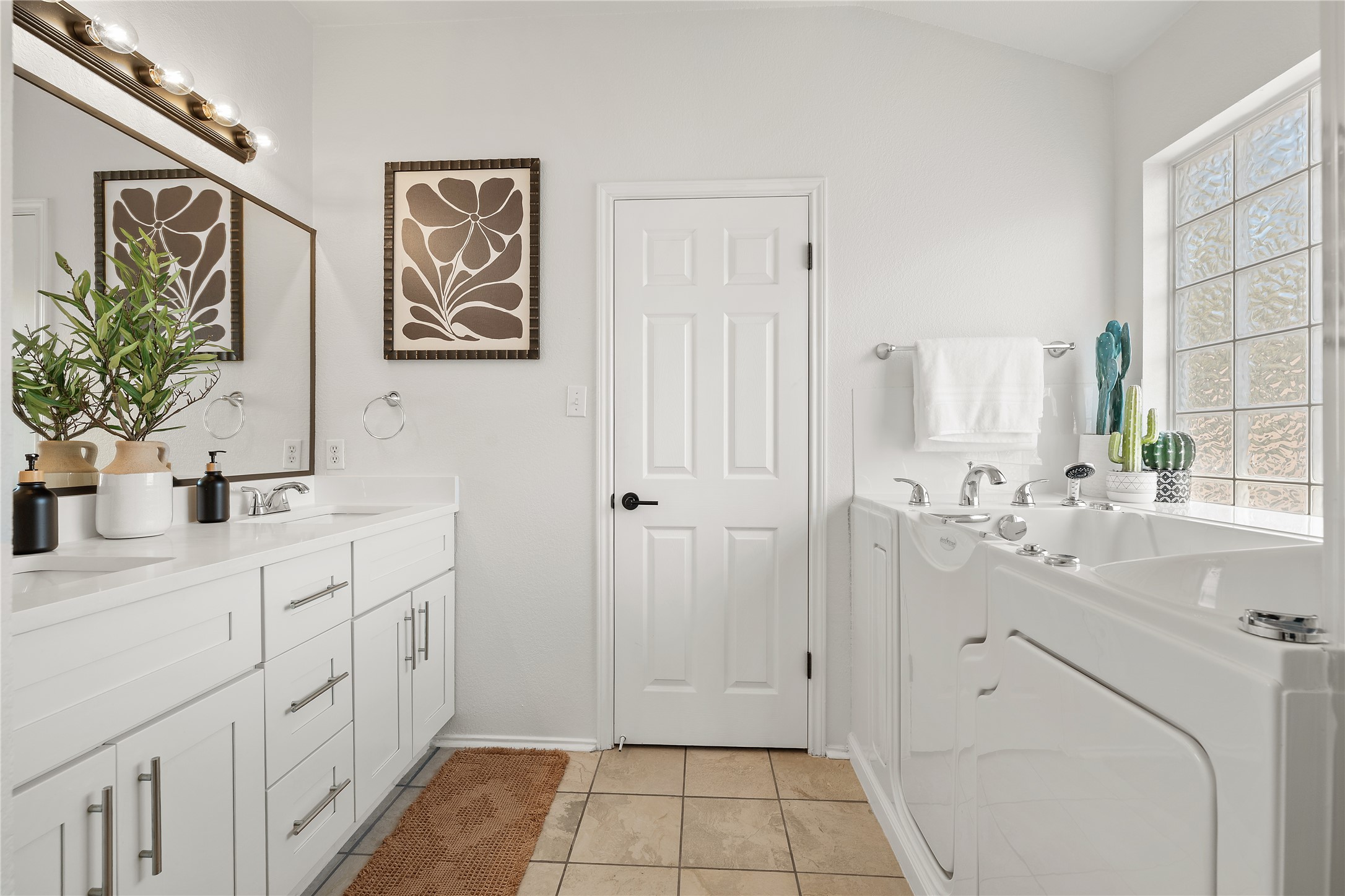 9257 Vigen Circle Austin, TX 78748 - Photo 20 of 33 a bathroom with a sink a mirror and a shower