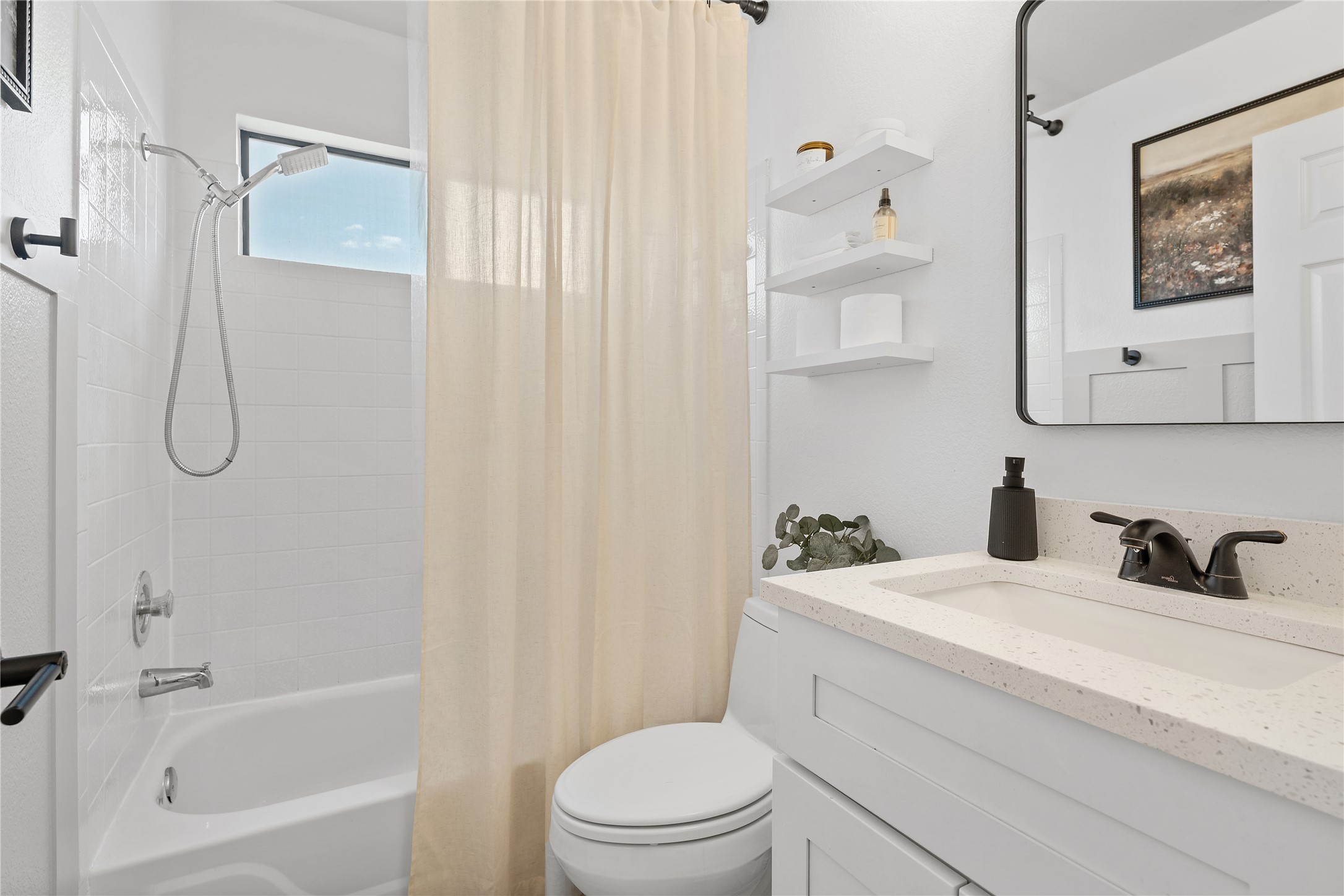 9257 Vigen Circle Austin, TX 78748 - Photo 24 of 33 a bathroom with a sink a toilet and shower