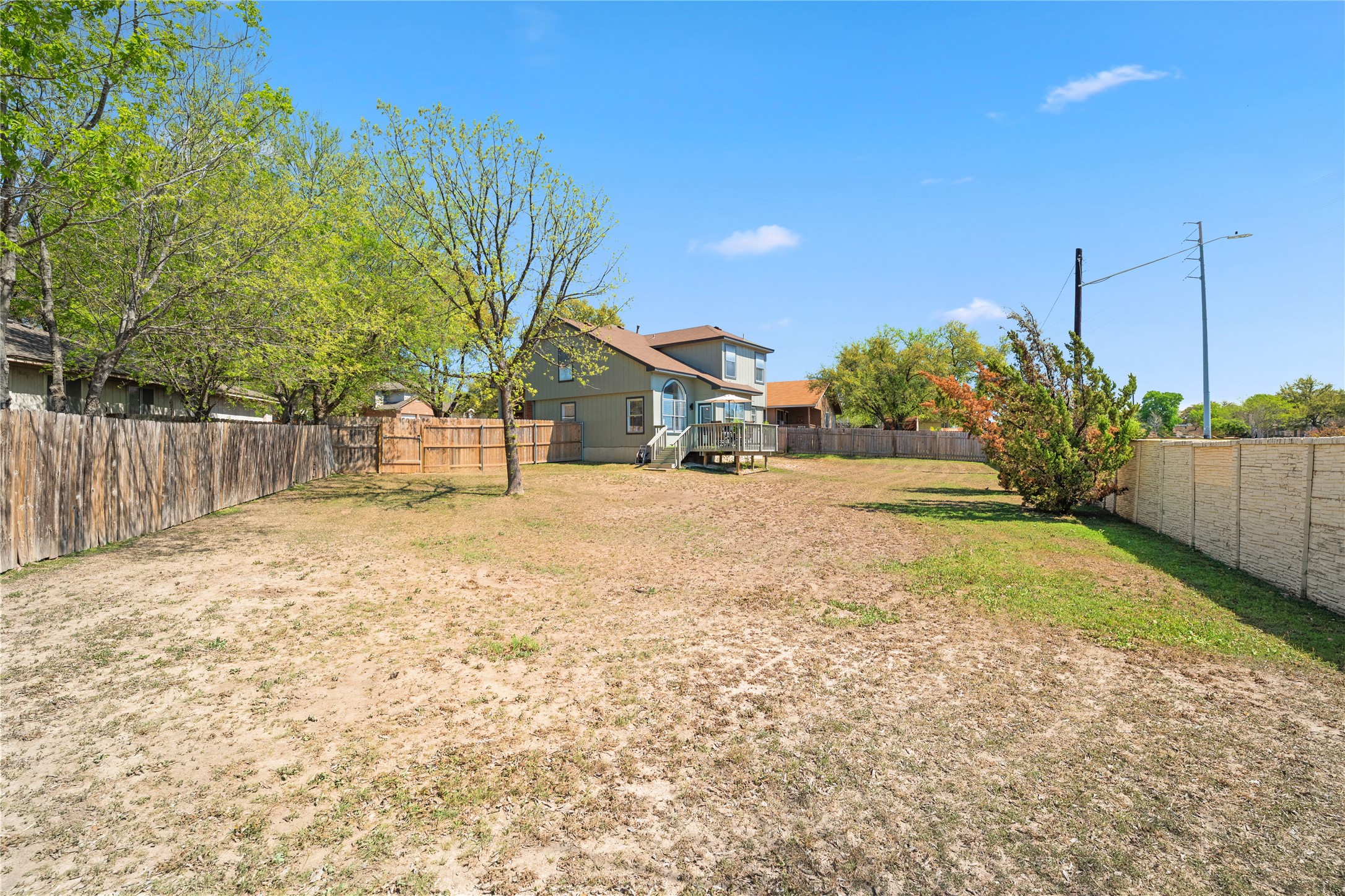 9257 Vigen Circle Austin, TX 78748 - Photo 29 of 33 a view of a yard with wooden fence
