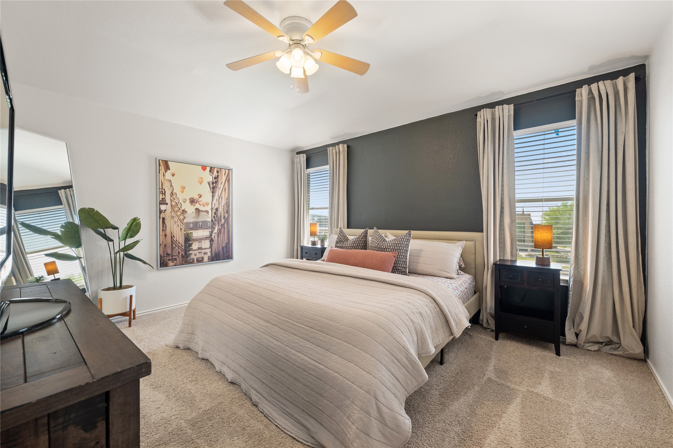 9257 Vigen Circle Austin, TX 78748 - Photo 7 of 33 a bedroom with a bed and a chandelier